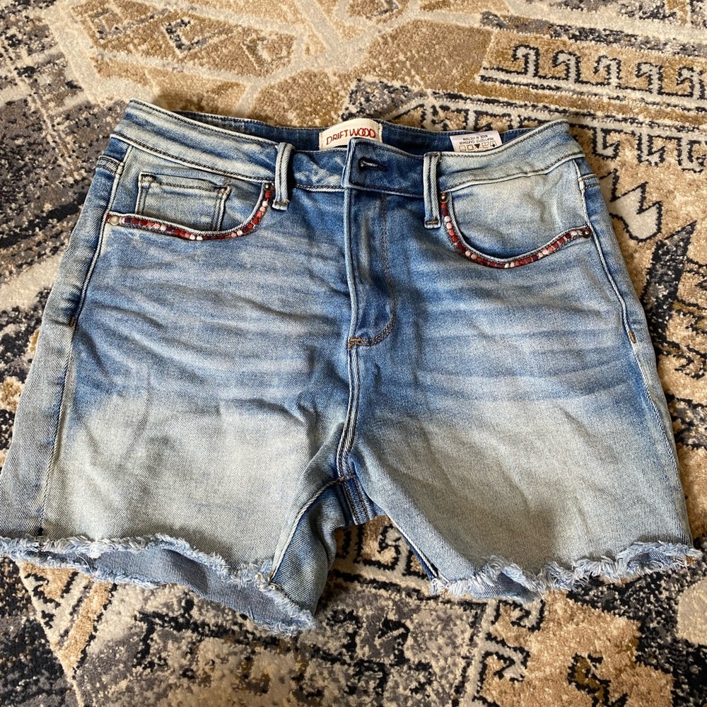 Driftwood midi jean shorts.